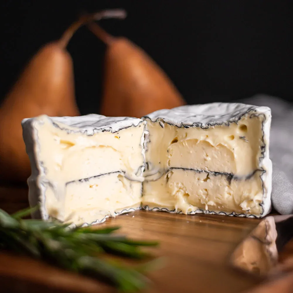 NEW - Black Cow, a delicious bloomy cheese with a line of ash through the centre